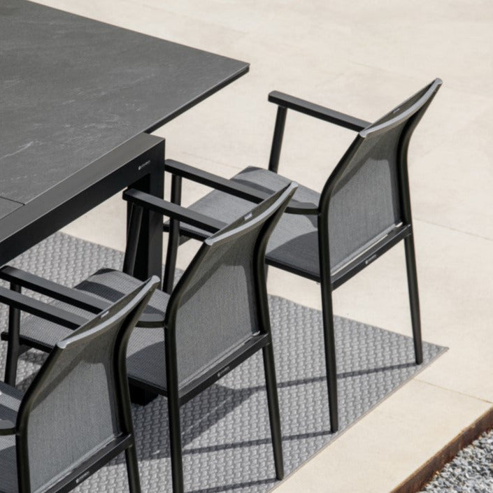 Livorno extendable garden table with all-ceramic table top 220-330x106 and Loya stacking chair in charcoal mat