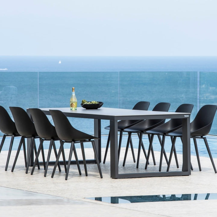Linate table with glass top and Galati bucket chair